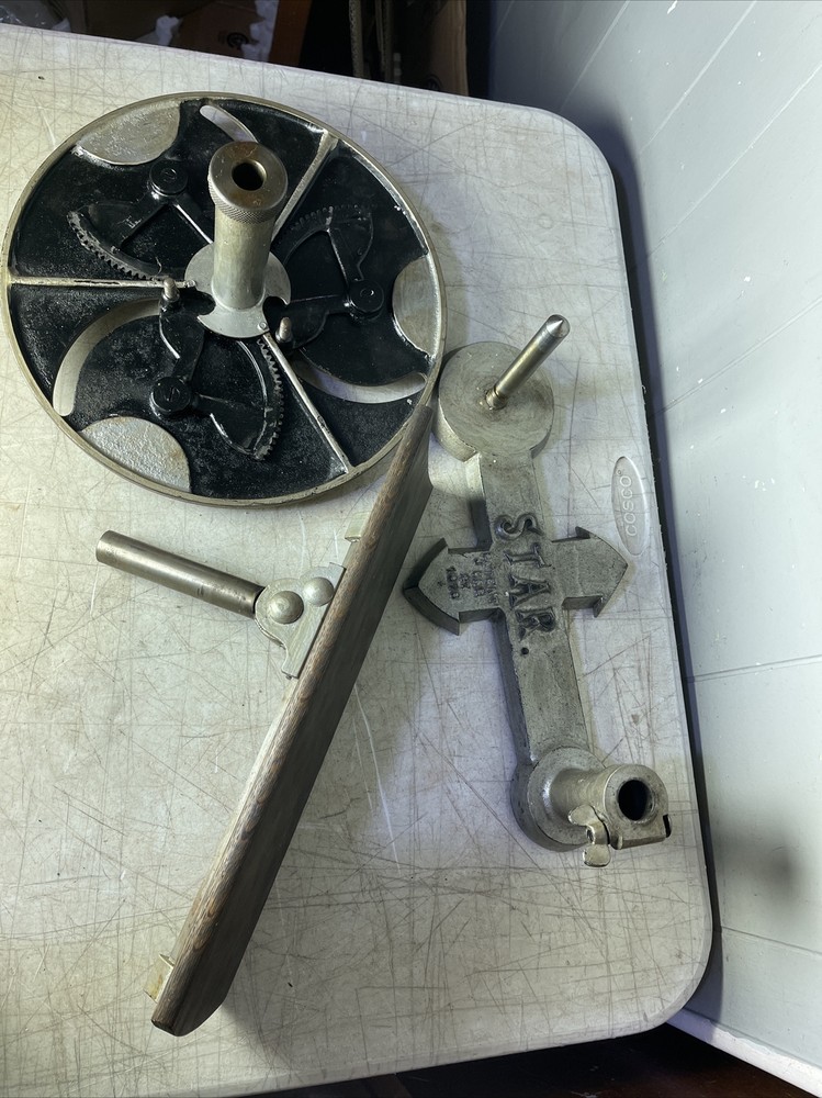 Antique Cast Iron Rotating Star Unknown Tool