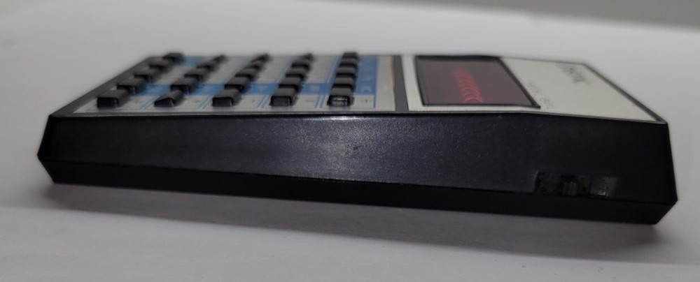 Unisonic Pocket Calculator Model 1541L Chipped Corner. UNTESTED