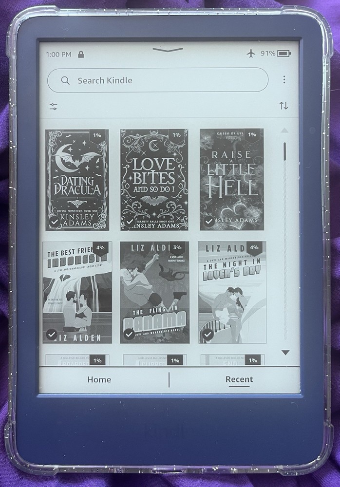 Amazon Kindle ereader Blue with books