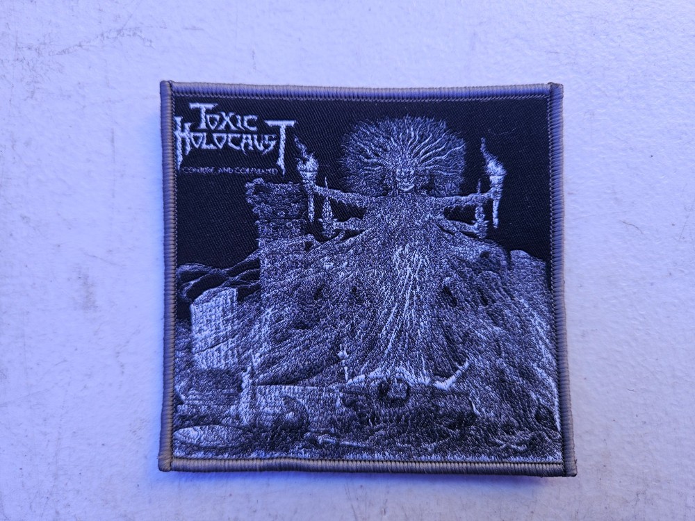 TOXIC HOLOCAUST, SEW ON GREY BORDER WOVEN PATCH