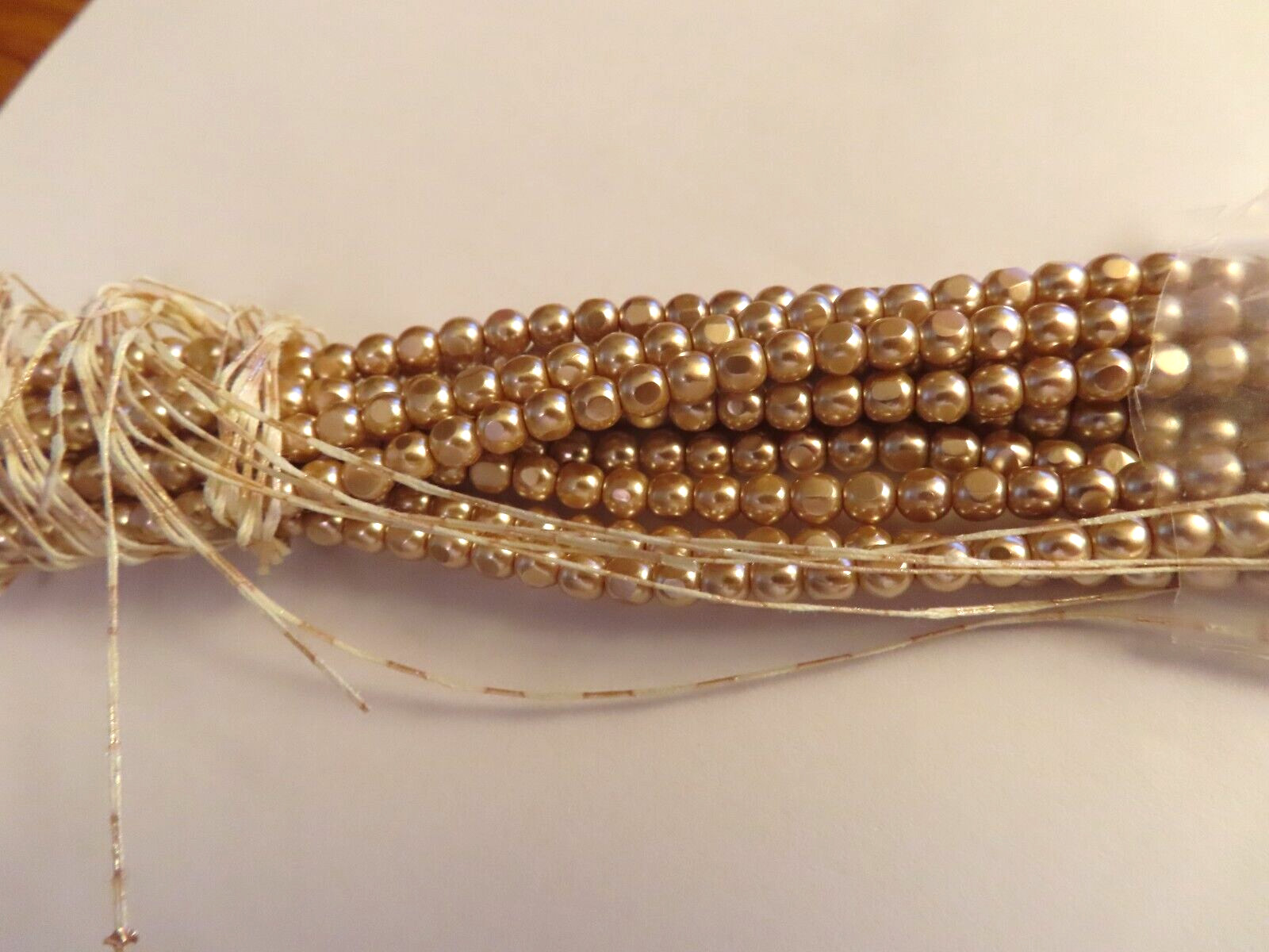 Sealed Strand of 600 Czech. Glass baroque Pearls 4mm Mauve.