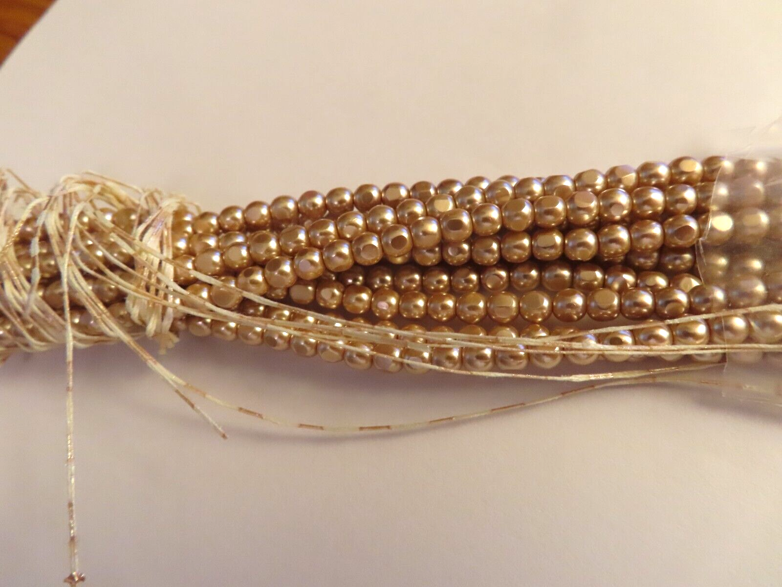 Sealed Strand of 600 Czech. Glass baroque Pearls 4mm Mauve.