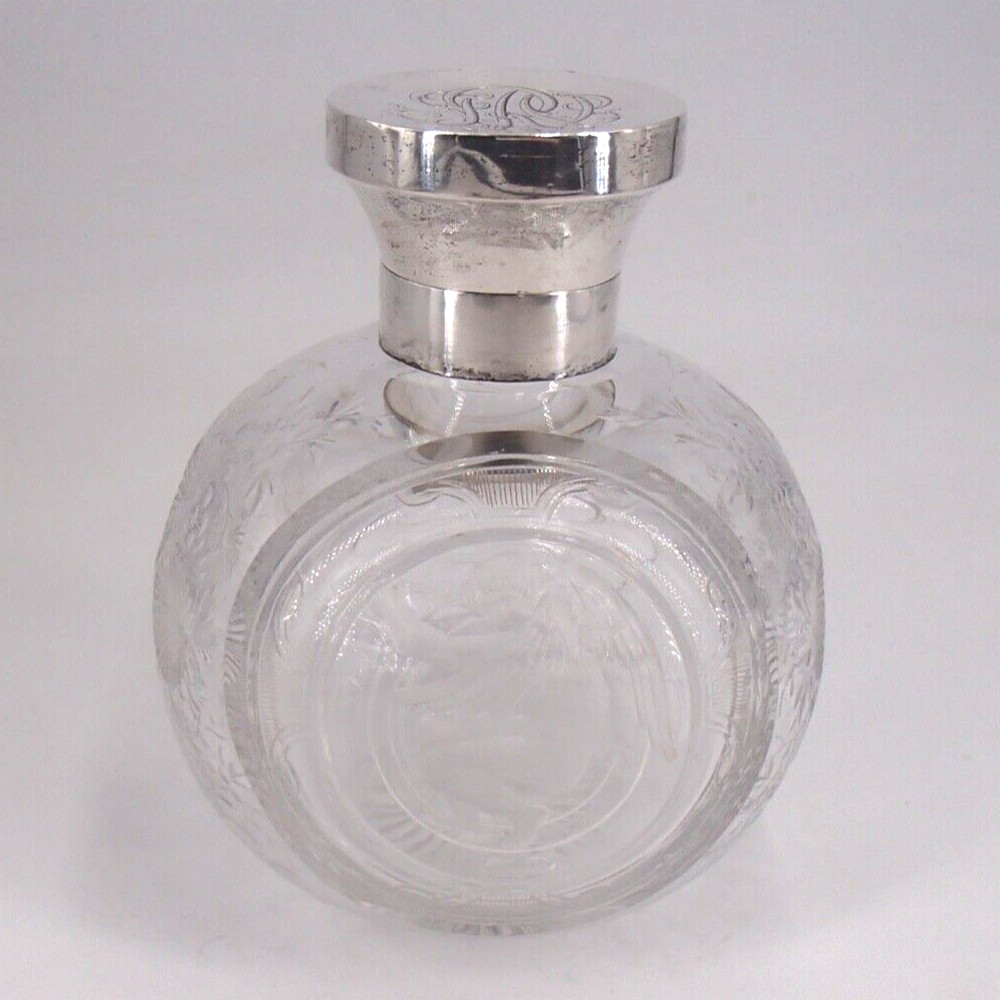 VERY NICE ENGLAND ORIGIN SOLID SILVER BOTTLE AND ANGELOT GLASS