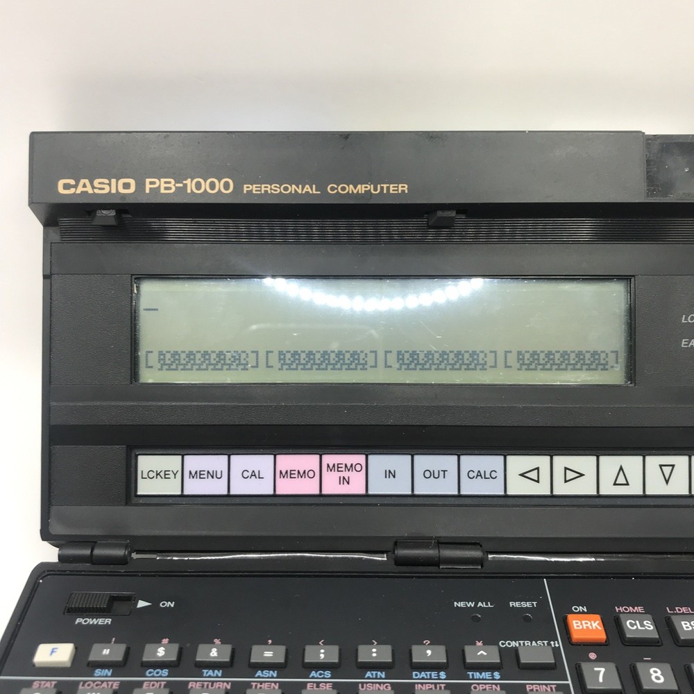 CASIO PB-1000 POCKET PERSONAL COMPUTER TURNS ON (NEEDS REPAIR)