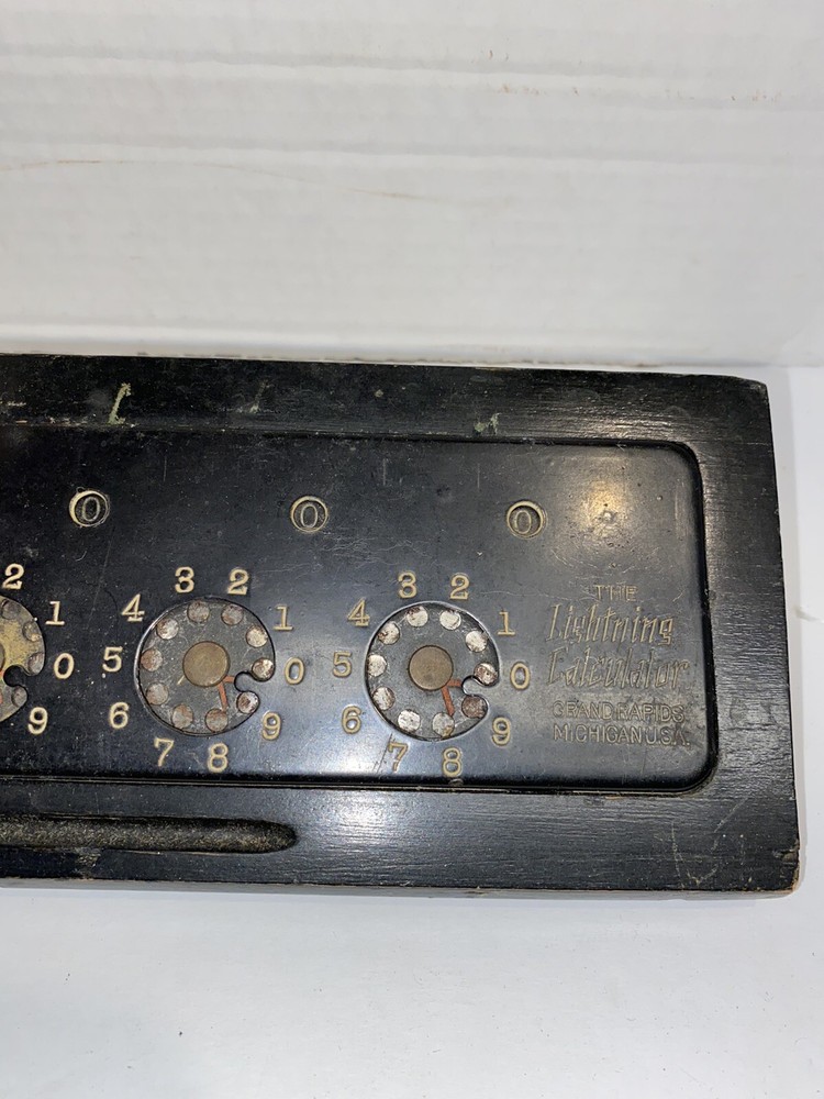 Vintage “ The Lightning Calculator “ Adding Machine Wood Base Grand Rapids MI