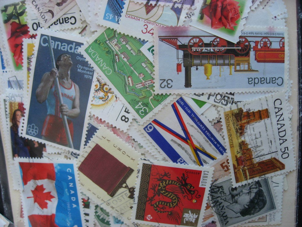 Canada colossal mixture (duplicates,mixed cond) 2000 old,new,35%comems,65%defins