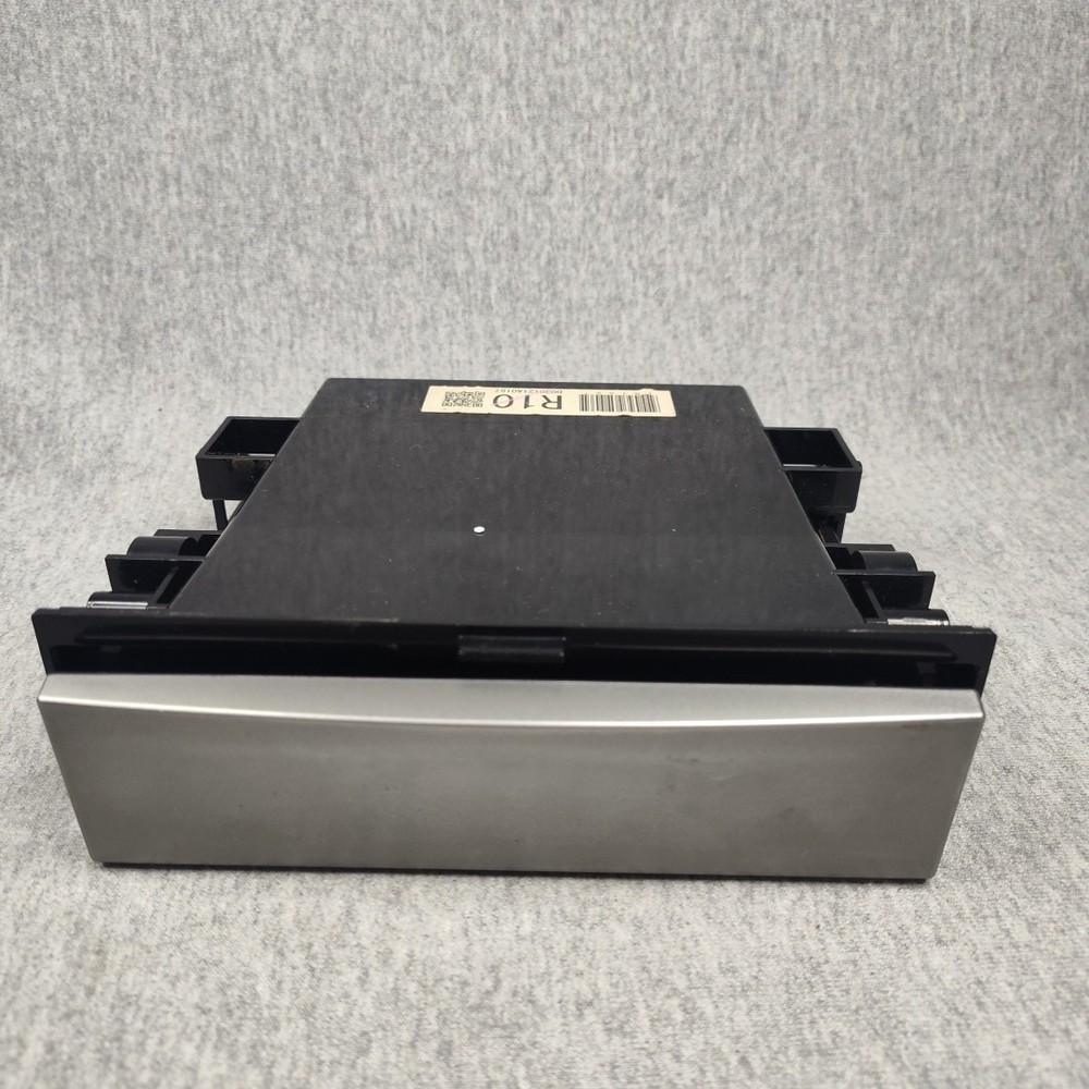 05  Legacy Accessory Holder Compartment Below Radio - Grey