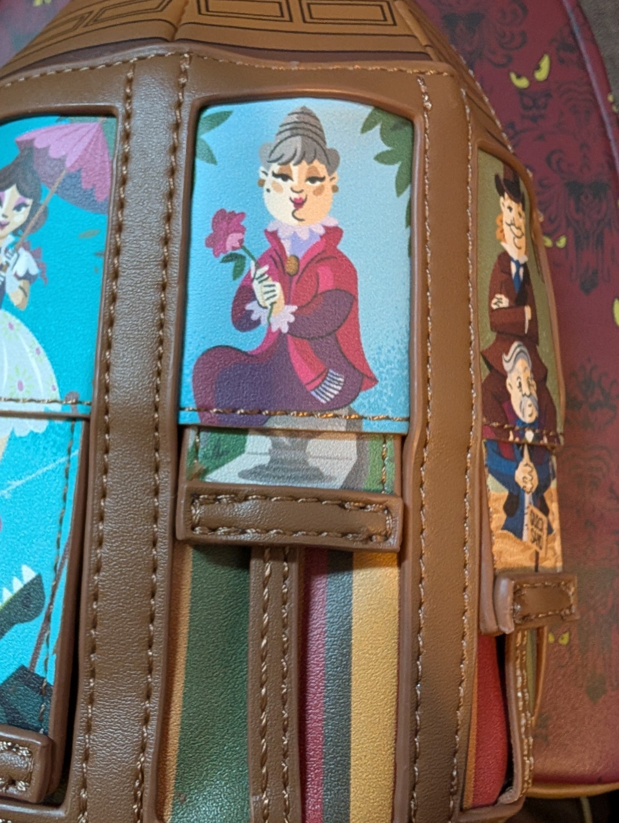 Disney Haunted Mansion Stretching Room Portraits Glow-in-the-Dark Mini Backpack