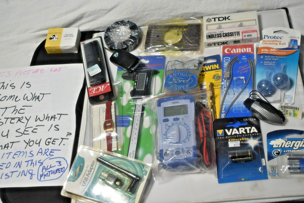 Somewhat Mystery box new tools gun Laser. Monocular Step drill bits More 8lbs.