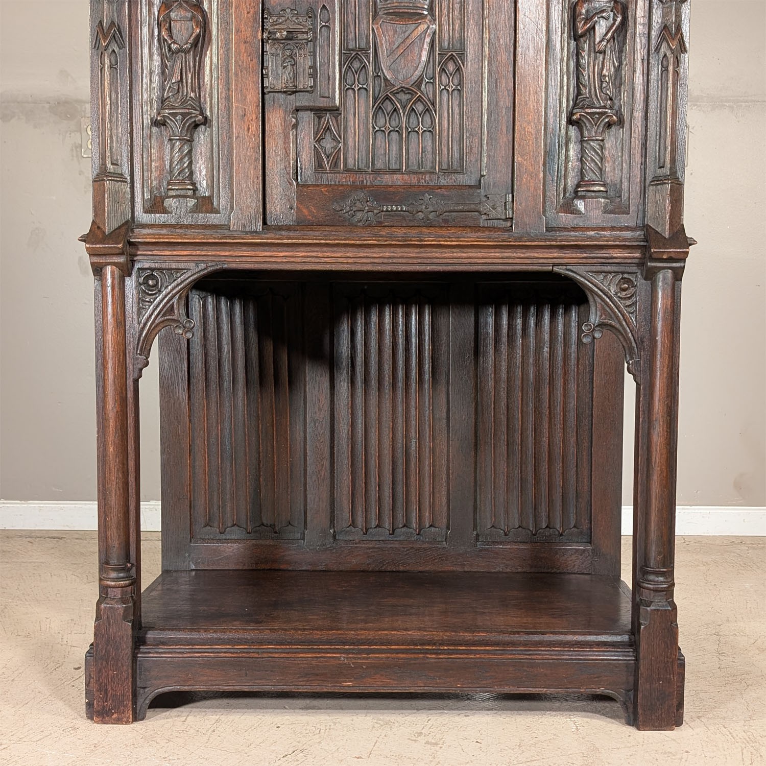 Antique French Gothic Carved Oak Cabinet Stand with Figural Panels Heraldic Door