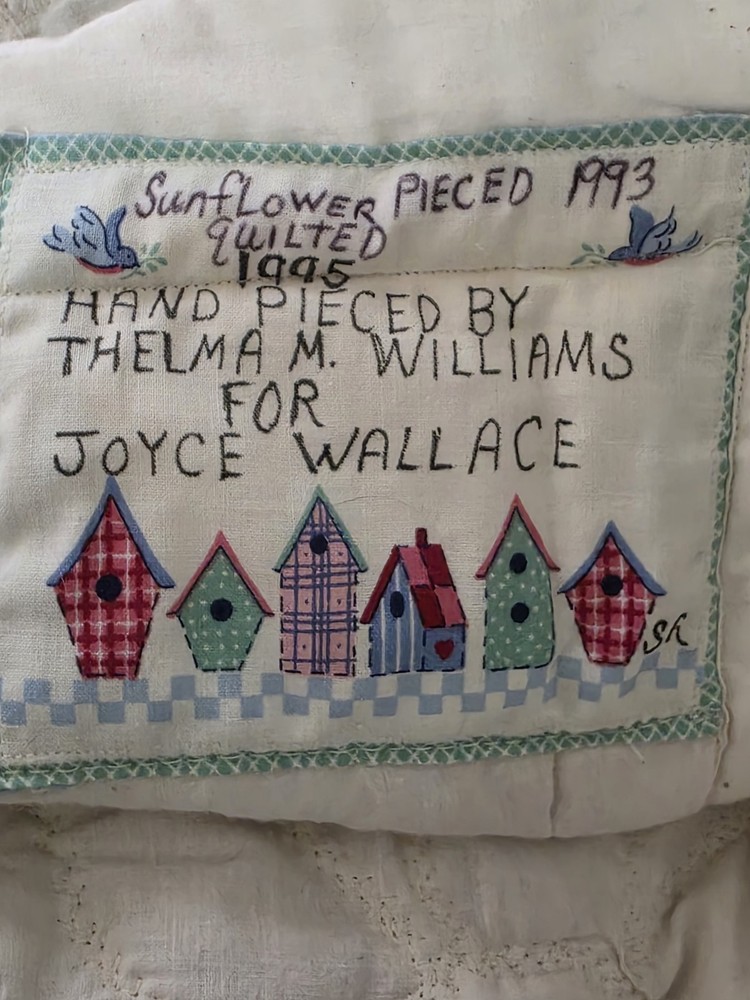 vintage handmade quilt featuring The Sunflower Pattern