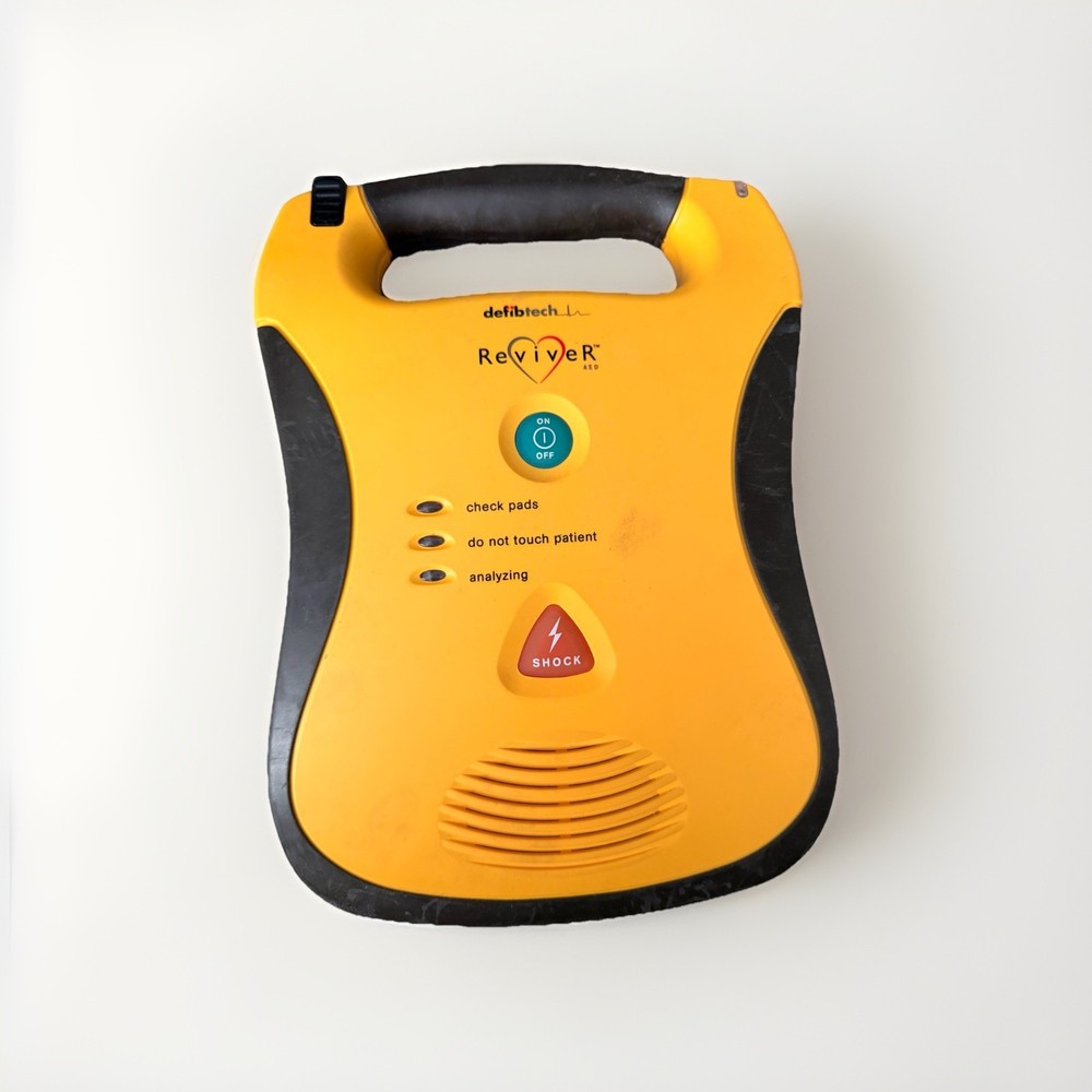 Defibtech Reviver AED w/ Battery , No Pad - WORKING