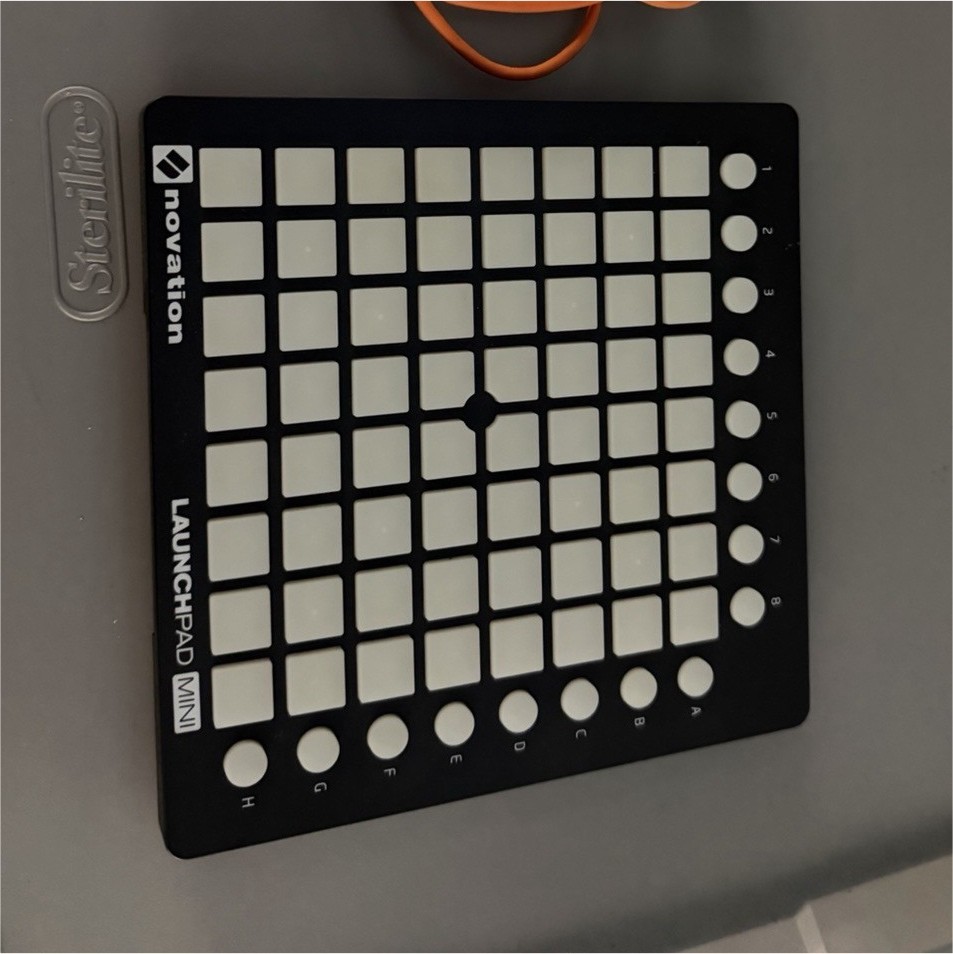 Novation Launchpad Mini MIDI Pad Controller, 64 Pads, Orange USB Cable