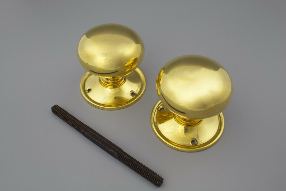 A pair of Solid Brass 65mm Unlaquered Victorian Brass Door Knobs Internal Handle