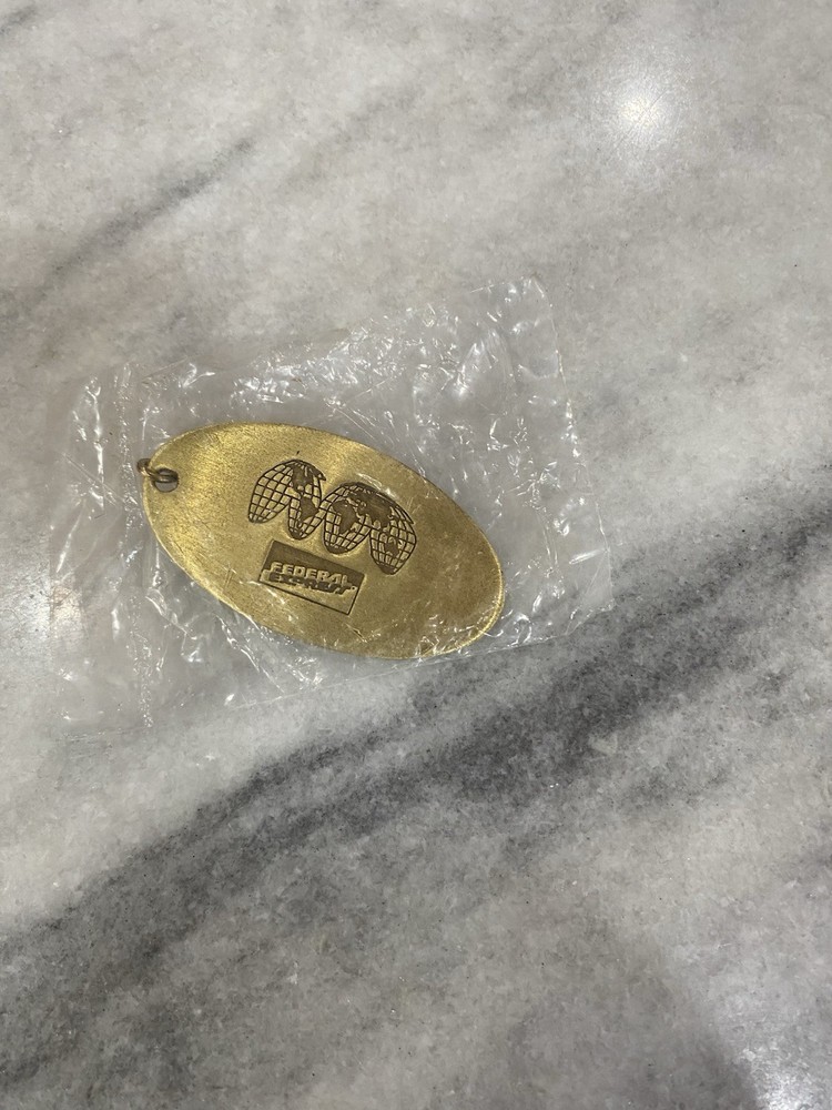 FEDERAL EXPRESS 1970'S  KEY CHAIN ....BRASS TYPE IN ORIGINAL PACKAGING