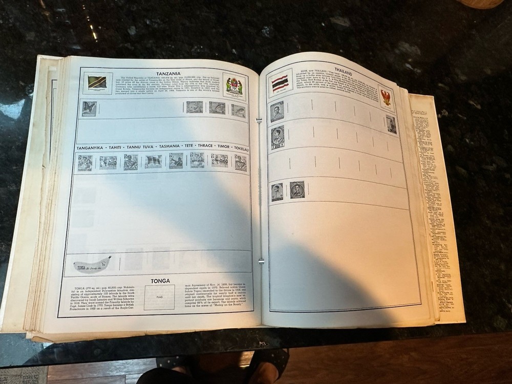 VTG 1977 Traveler Stamp Album With Many Stamps.