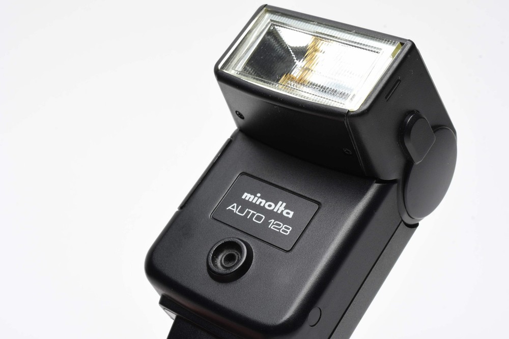 Minolta Auto 128 electronic flash, nice & clean, tested, w/Case+Manual+Diffuser