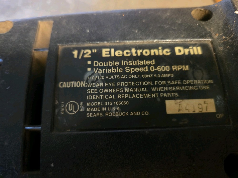 Sears Craftsman 1/2 Inch Reversible Variable Speed Drill with side handle.