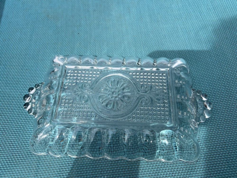 small rectangle shape crystal server with handles.  In good condition.