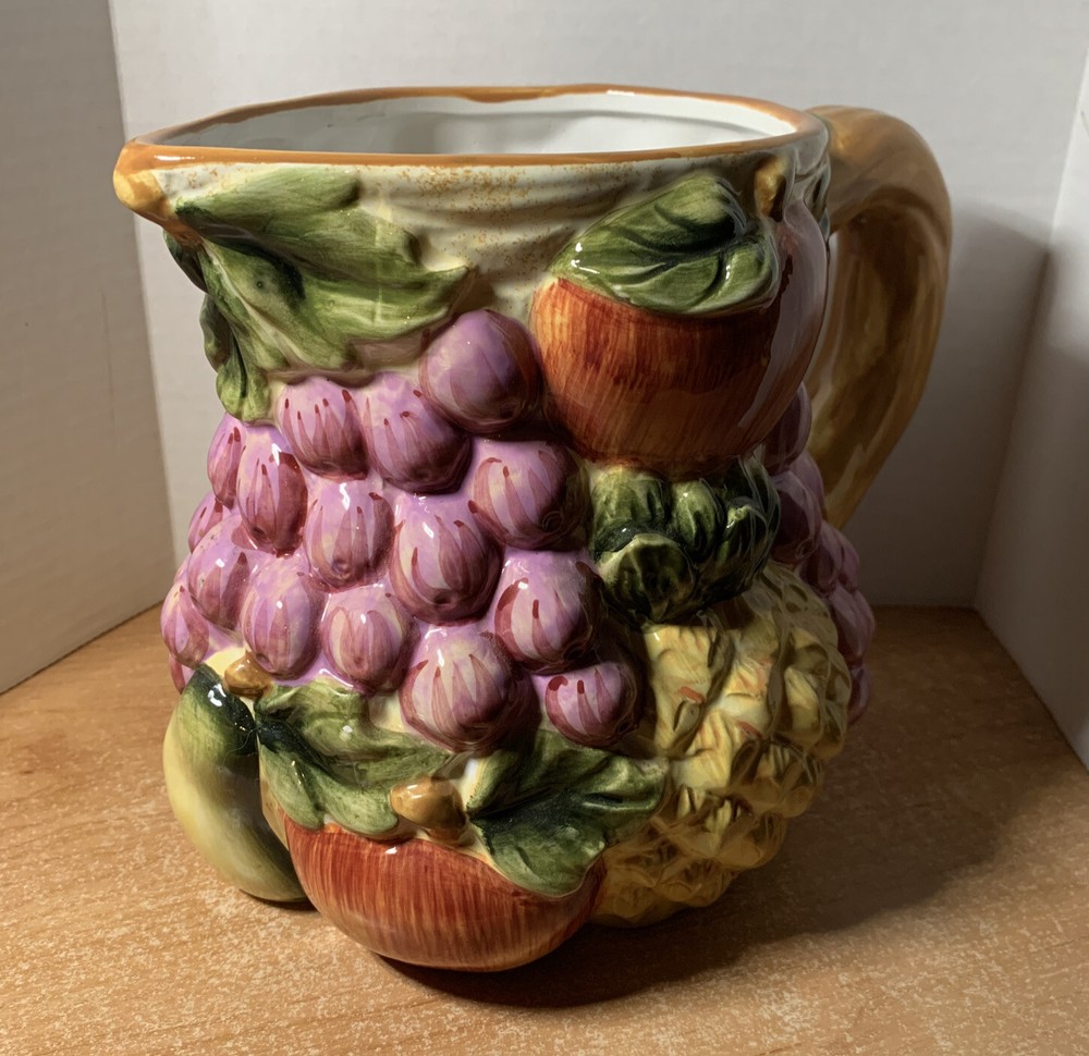 Baum Bros Style Eyes Raised Fruit Pitcher Pineapple Grapes, Apples 7"