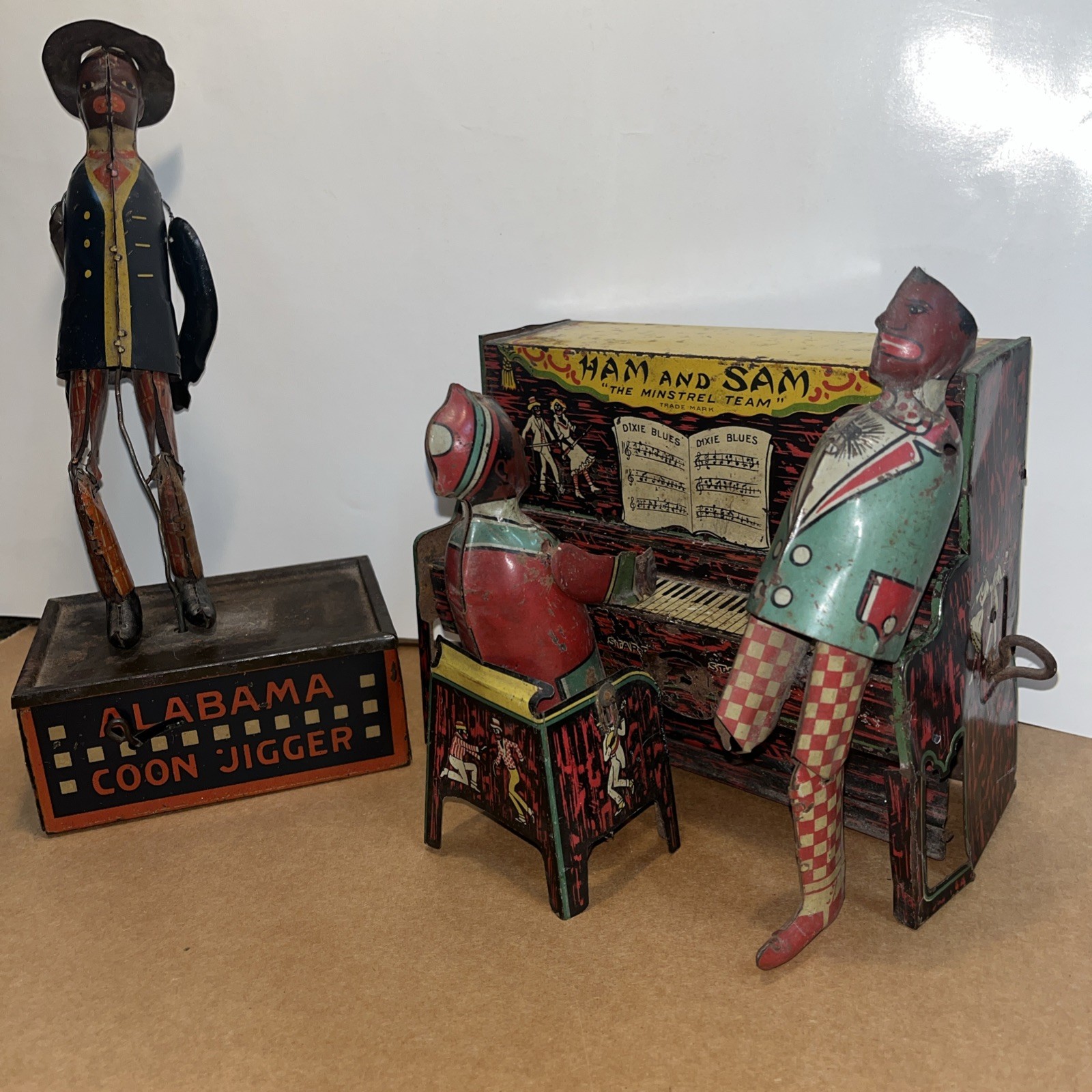 Set of 2 tin toys Ham and Sam The Minstrel Team & “TOMBO “Alabama Coon Jigger
