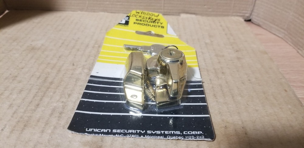 ilco Unican Security Products Brass Security Window Lock. NOS-Damaged packaging