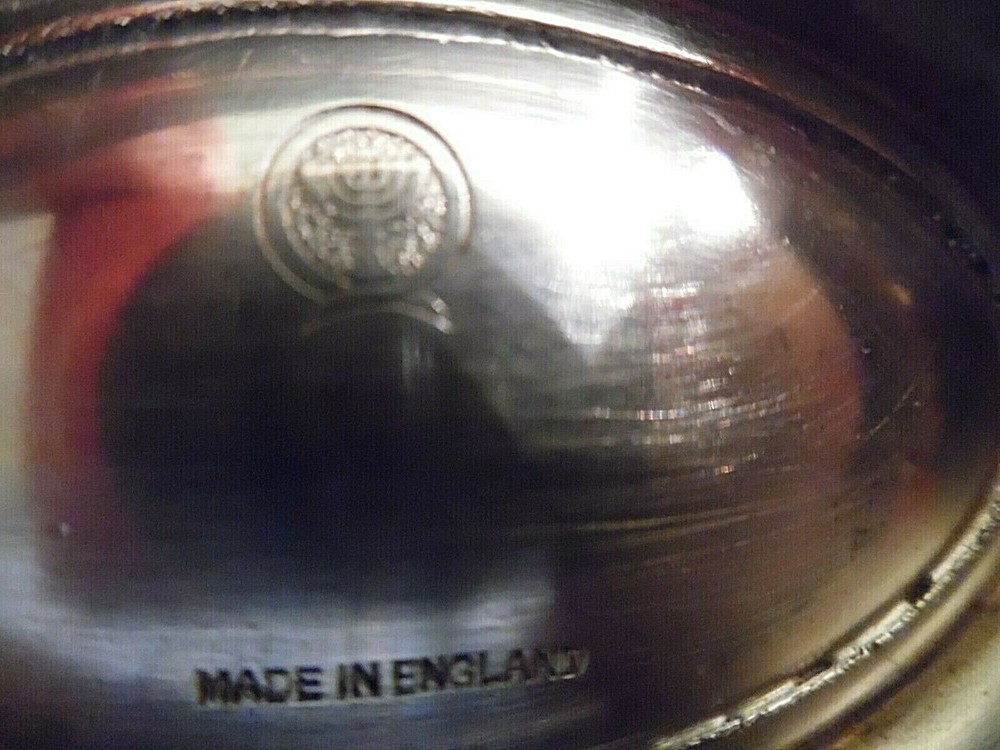 PIERCED SILVERPLATE OBLONG FOOTED CANDY DISH MADE IN ENGLAND WITH HALLMARK