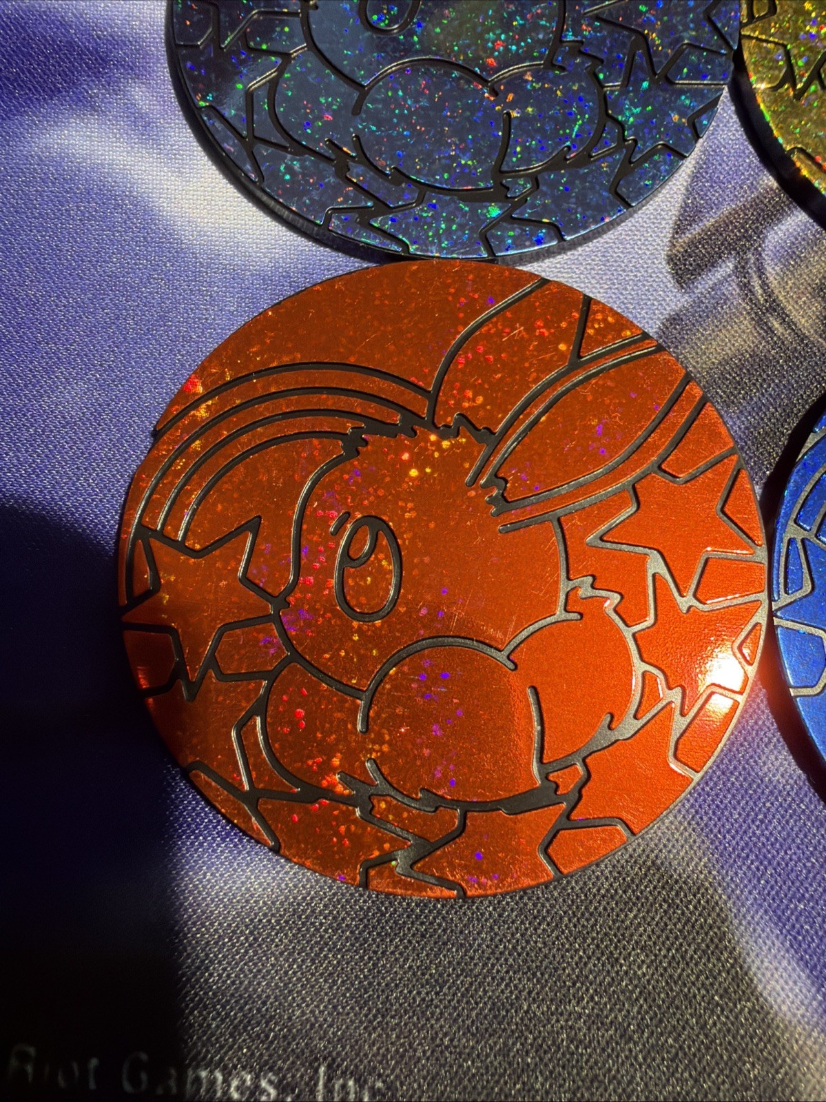 Set Of 7 Pokemon PRISMATIC EVOLUTIONS Jumbo Eevee Coins Sparkle Red Blue Pink