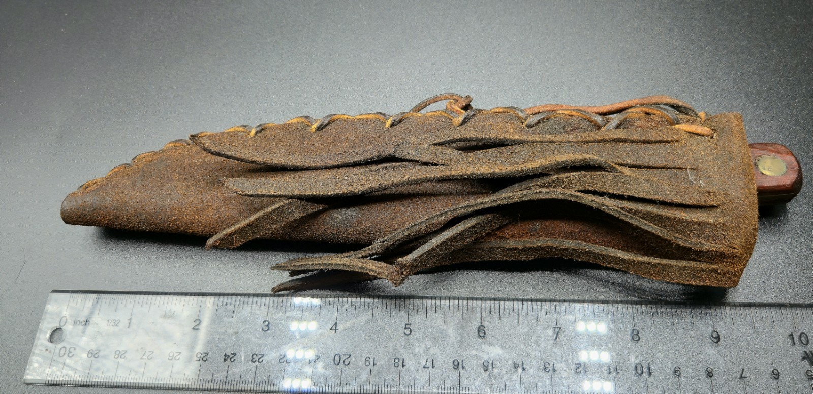 Vintage Trade Knife collectible with leather fringe sheath