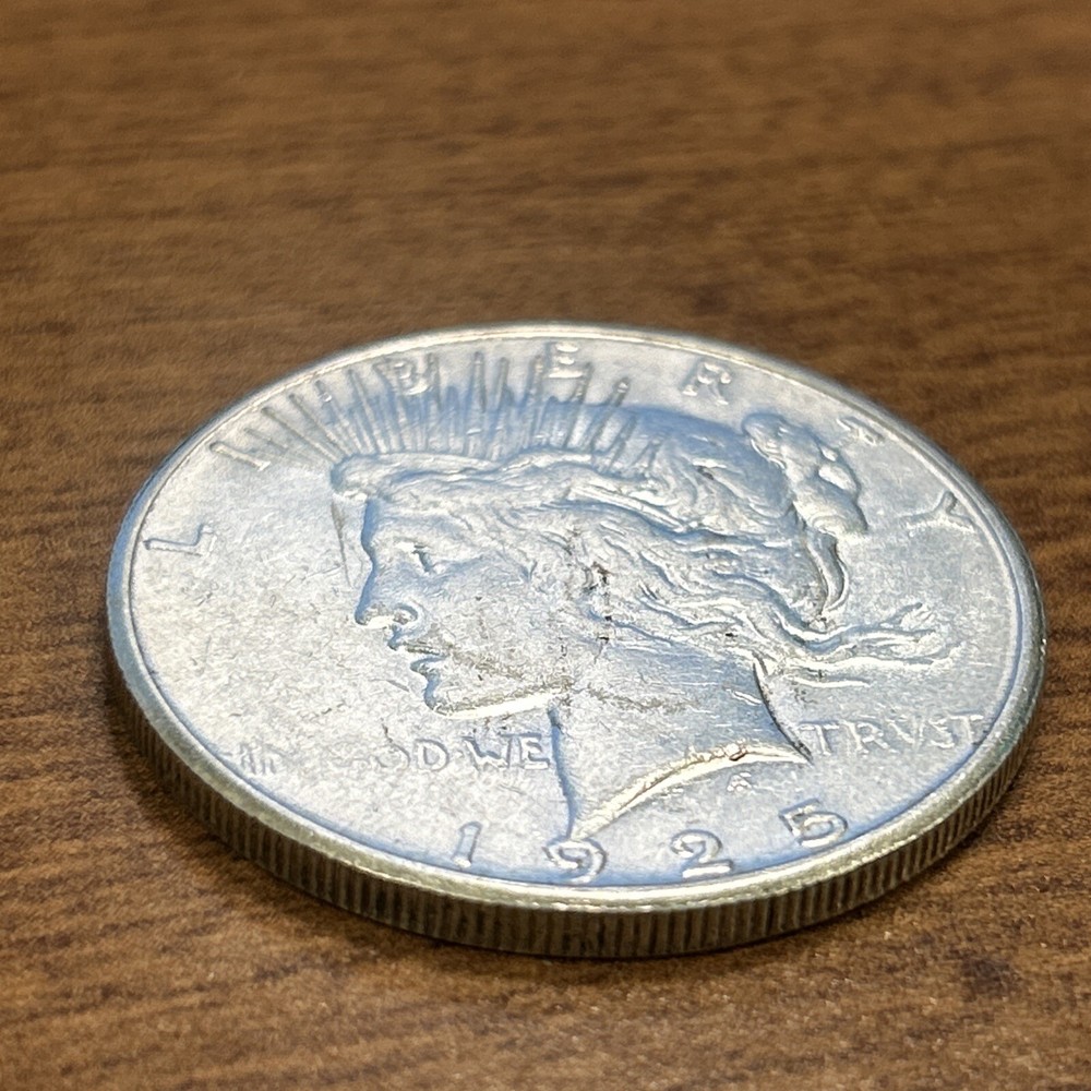 1925-S $1 Peace Silver Dollar AU+