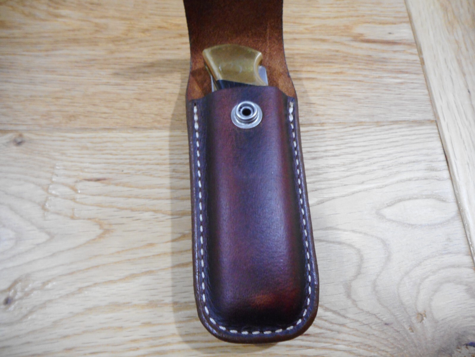 Buck 110 custom leather knife sheath. Brown. Tooled flap. Sheath only