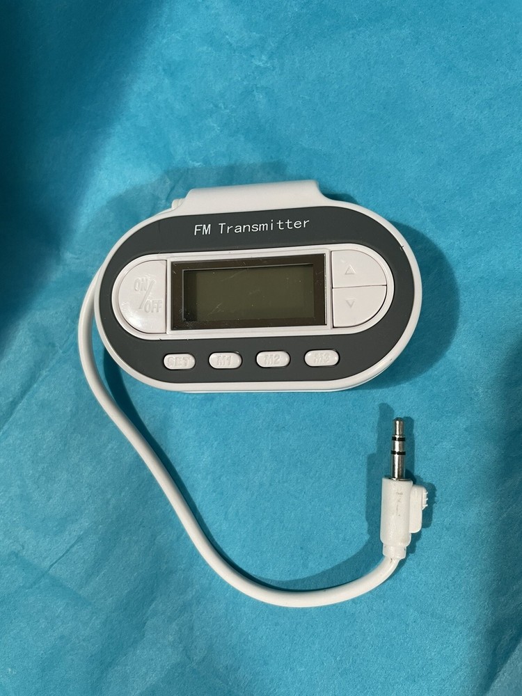 In Car FM Transmitter w Charger Model SP2202