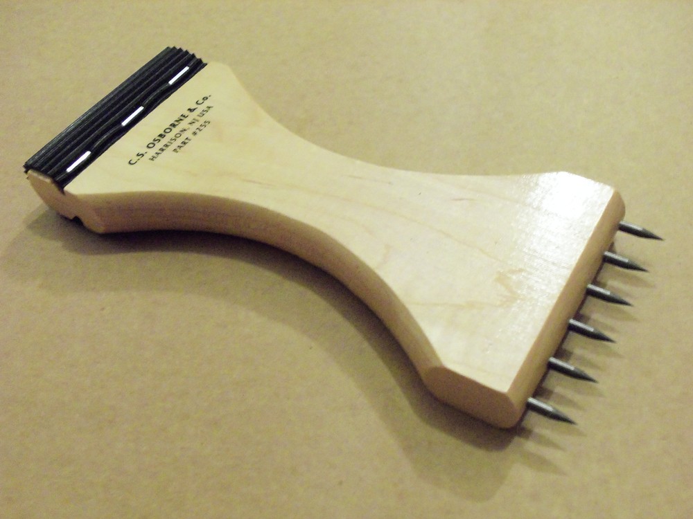 C.S. Osborne #255 Webbing Stretcher With Rubber End