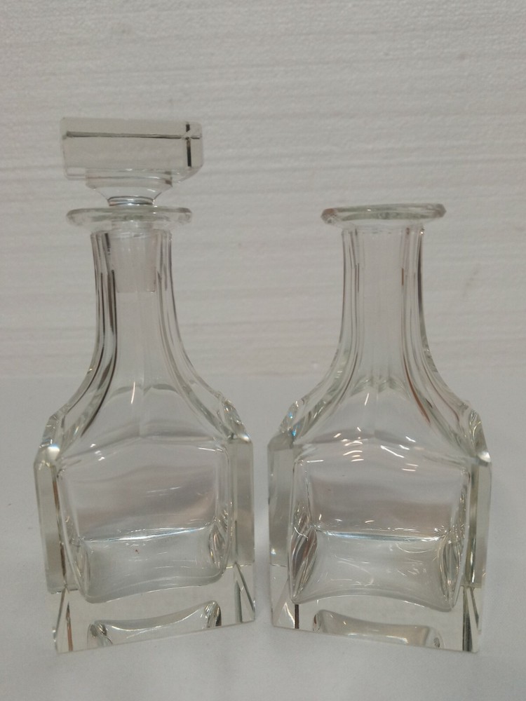 Two 4in Clear Glass Bottles One Stopper