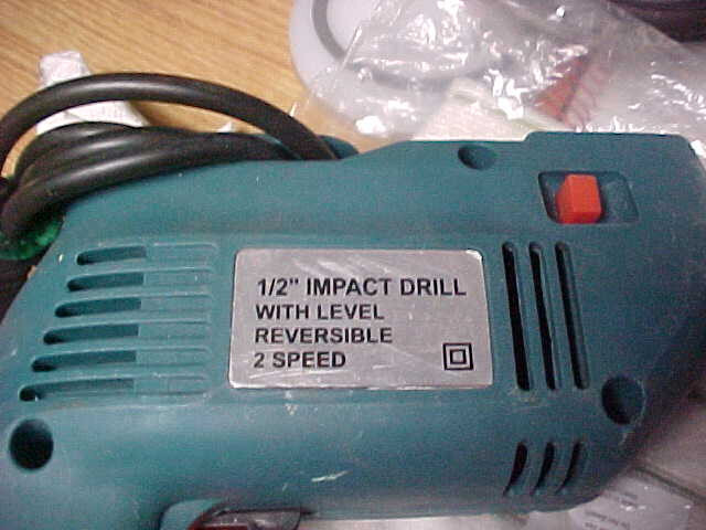 1/2 inch impact drill w/ level. reversible. 2 speed