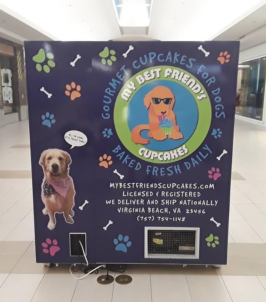 Touchscreen cold vending machine with elevator.