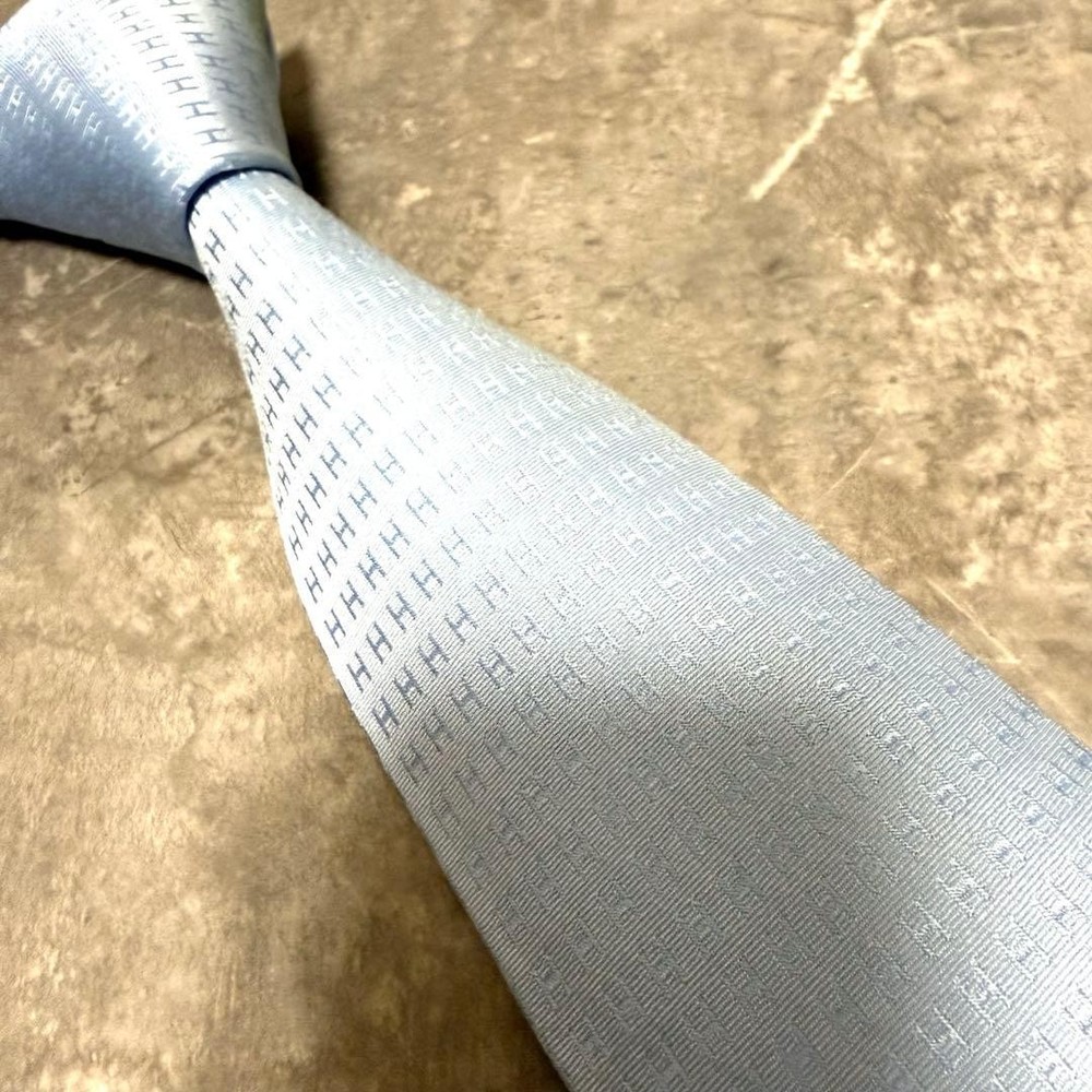 HERMES tie light blue fasone H pattern