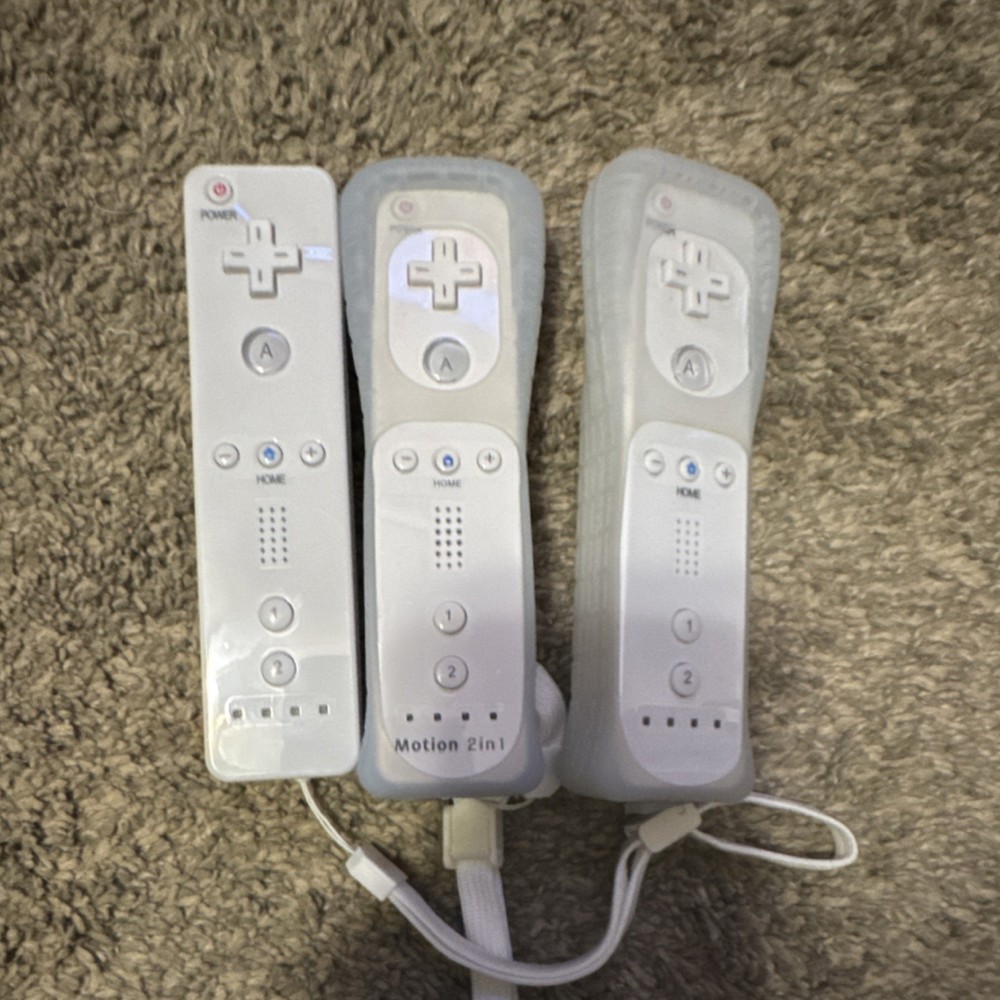 Nintendo Wii Console Bundle with Remotes, Nunchuks, Sensor Bar, AV Cables