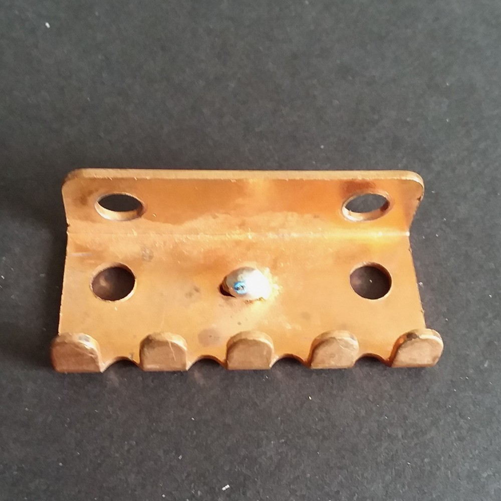 Vintage tremolo claw brass