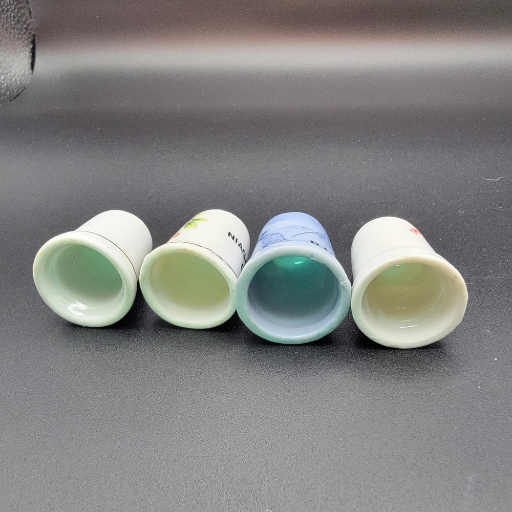 8 Collectible Thimbles From Various Destinations