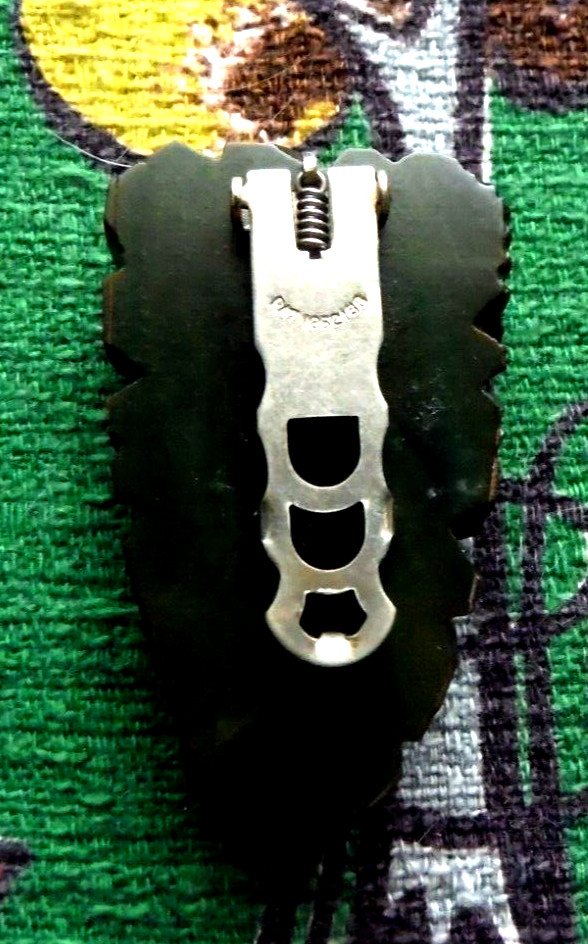 Antique dark green Bakelite leaf clip pin