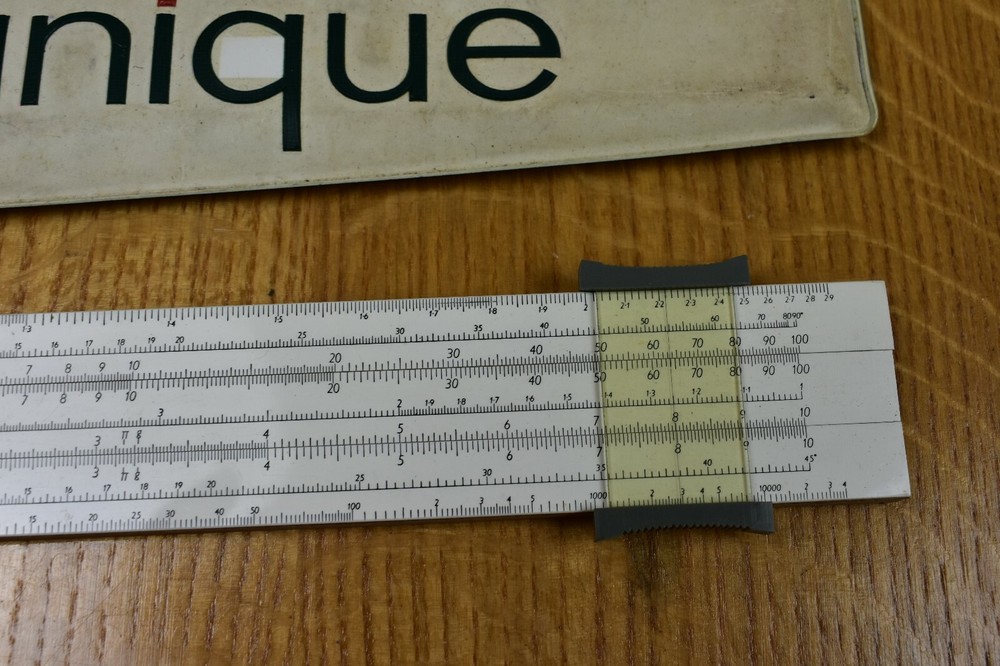 Unique Universal One slide rule, Cased
