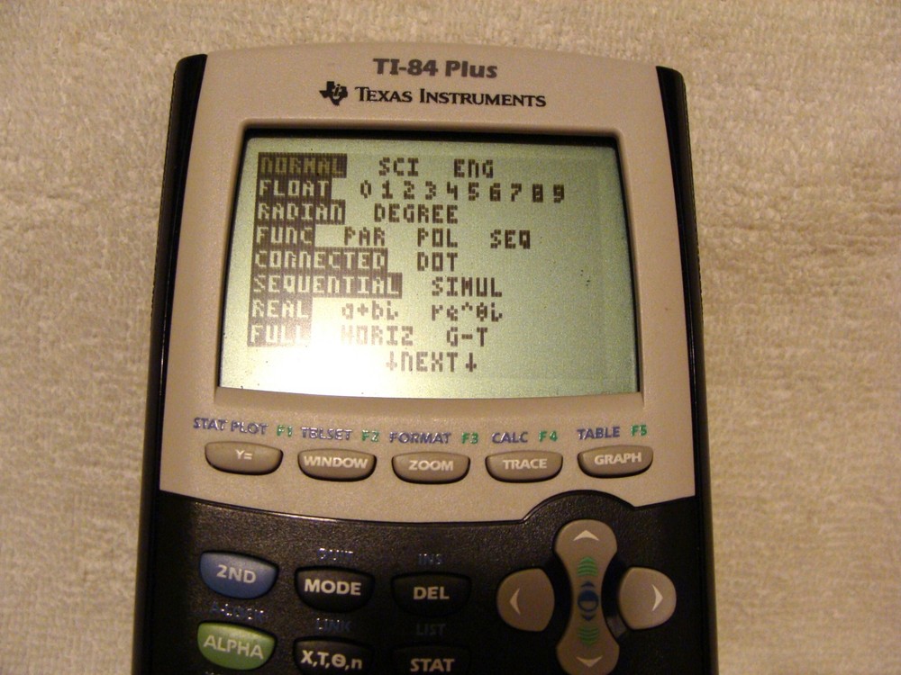 Texas Instruments TI-84 Plus Graphing Calculator with Hard Cover
