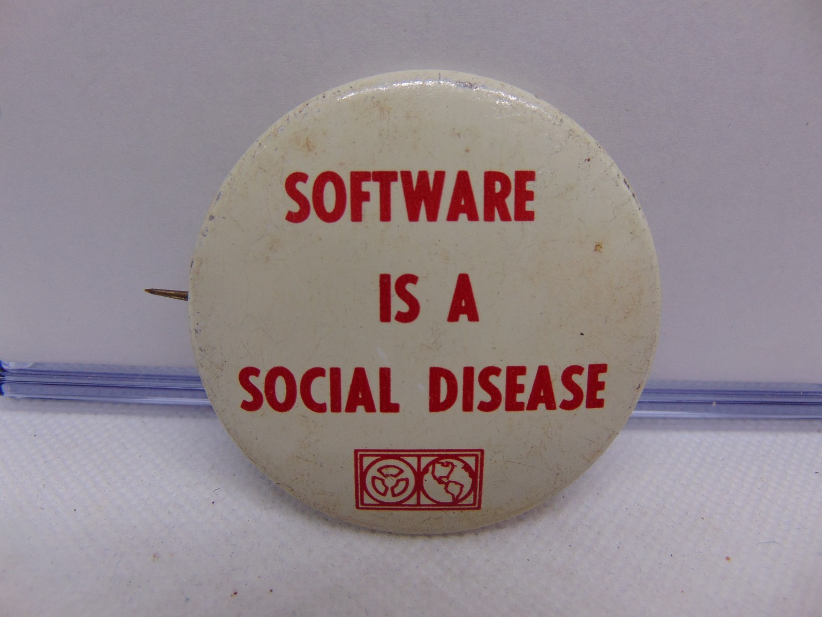 Vintage Computerworld Magazine Pinback Button Software is a Social Disease