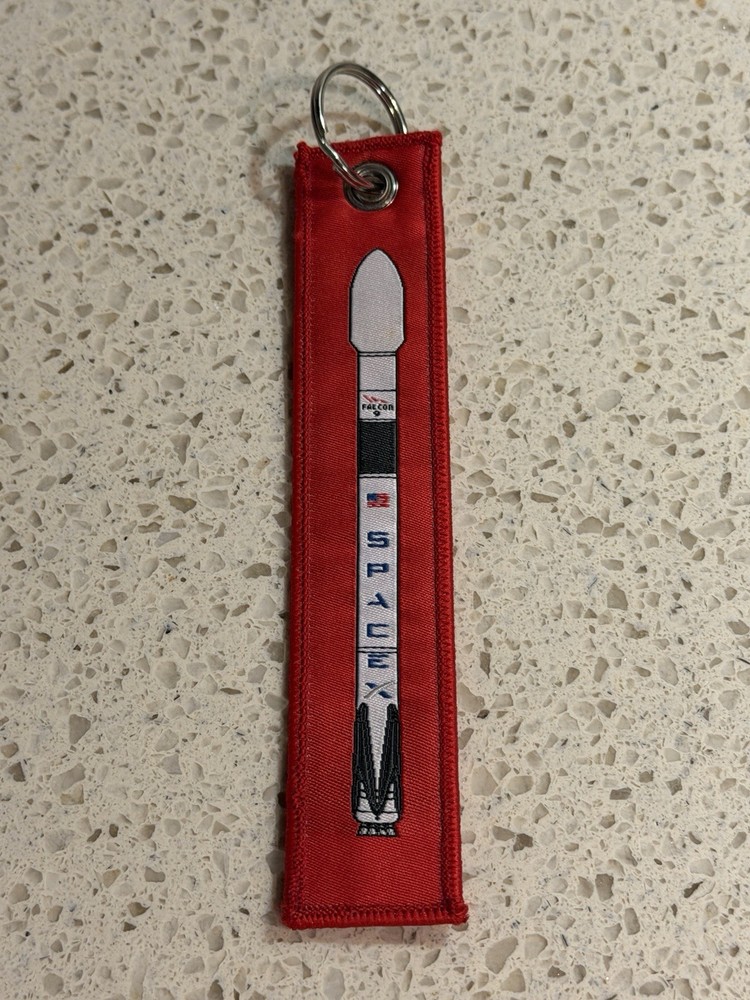 Pre-Owned Red SpaceX Falcon 9  Rocket Remove Before Flight Keychain Zipper Pull