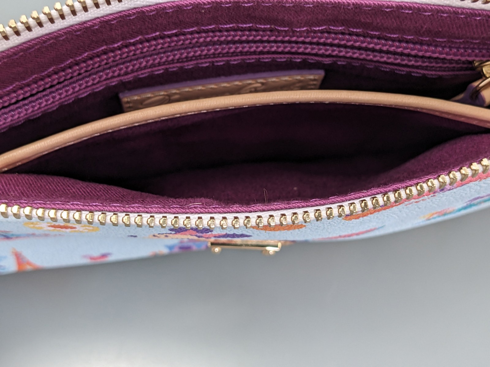 Disney Parks Dooney & Bourke Pouchette Crossbody Bag Epcot Flower Garden Lt Blue