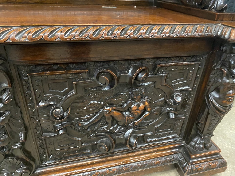CARVED FIGURAL WALNUT BENCH