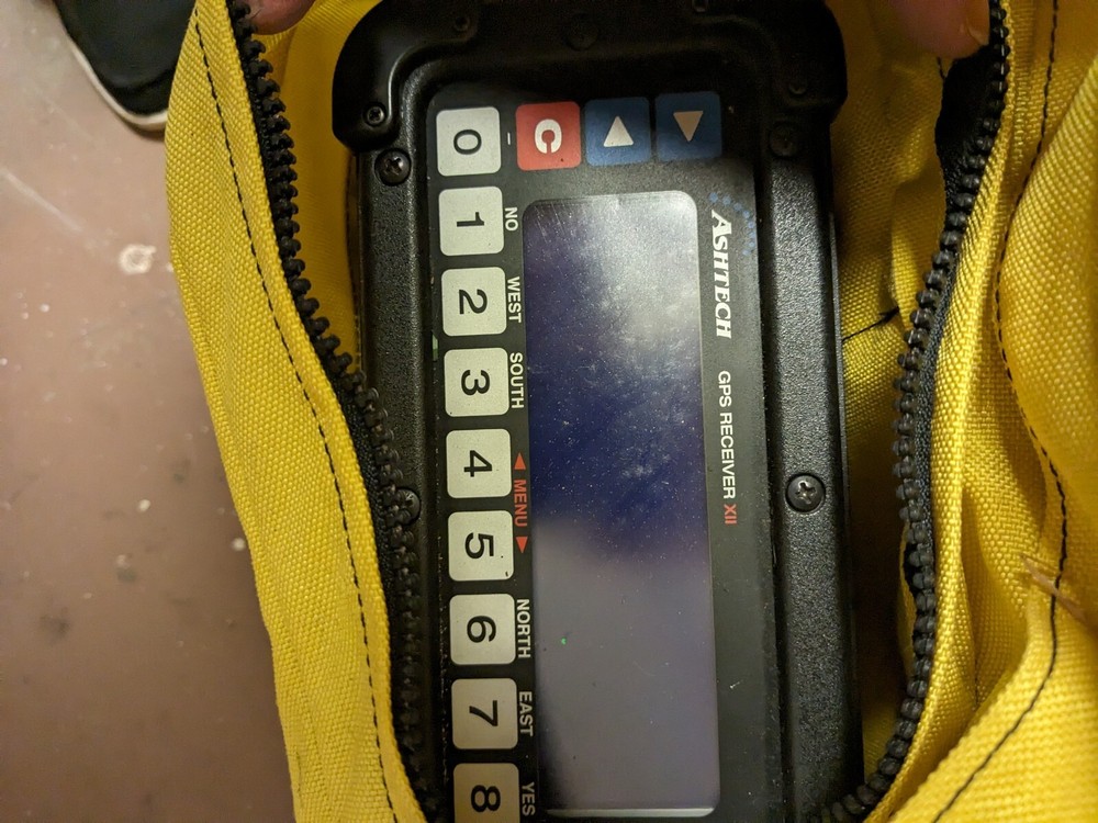 Ashtech Surveying GPS Receiver XII in yellow Trimble backpack