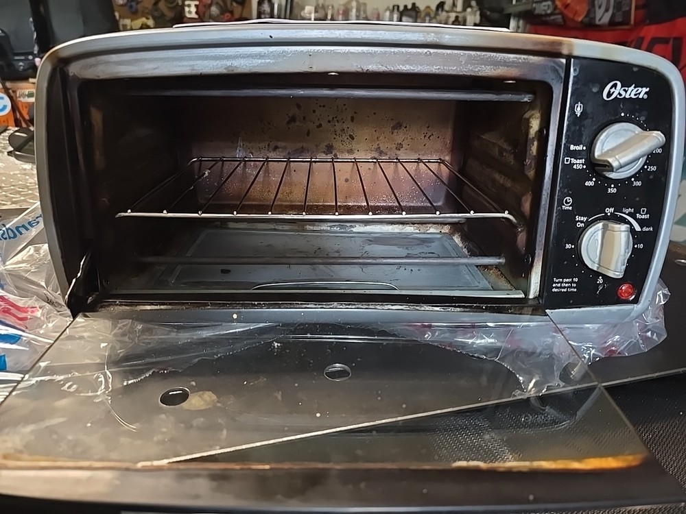 Oster Toaster Oven, 4 Slice, Black (TSSTTVVG01)