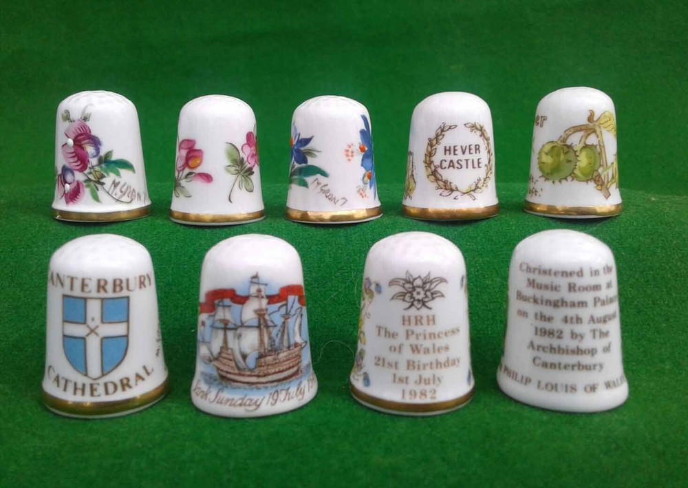 9 CAVERSWALL BONE CHINA THIMBLES.